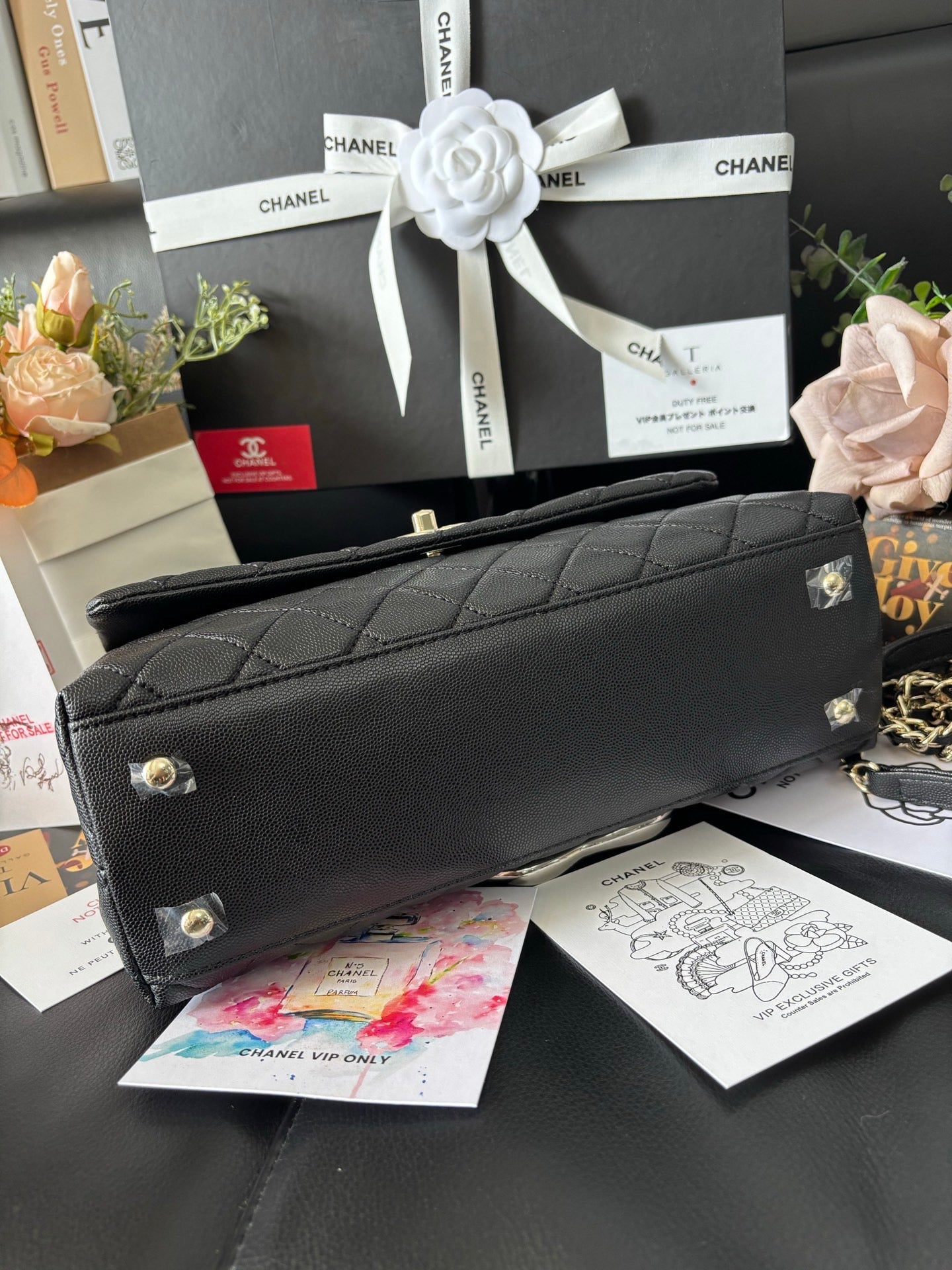 Black Quilted back caviar calfskin leather with gold-tone chain and top handle