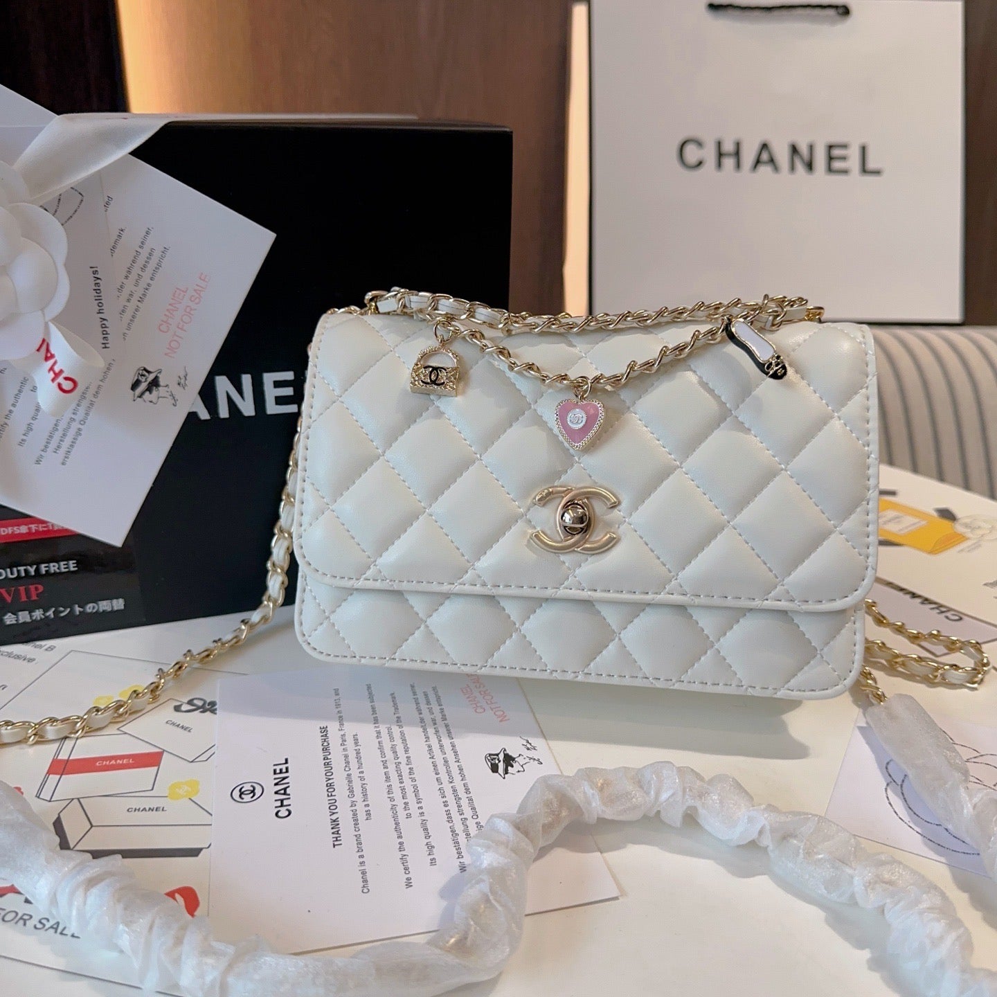 White Sheepskin Woc Bag With Charm